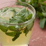 fresh Meadow Tea with mint and lemon in a glass