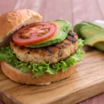 Healthy Ground Chicken Burger on a wooden cutting plate