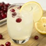 White Cranberry Juice with lemon in a glass