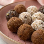 protein balls with oats and chocolate on a plate
