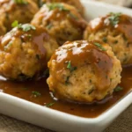 turkey stuffing balls with sauce on a plate