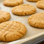 Peanut Butter Cookies on pan out of oven