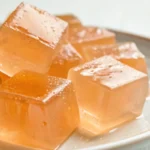 gelatin diet trick with gelatin cubes in orange colors on a plate