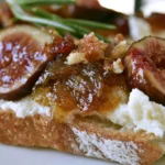 fig preserves recipe showing golden brown preserves in a glass jar with fresh figs beside it