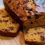 Chocolate chip pumpkin bread sliced loaf showing moist interior with melted chocolate chips