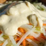 Coleslaw dressing recipe overhead view showing creamy texture and fresh vegetables