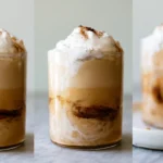 Pumpkin cold foam floating on top of iced coffee in a clear glass with ice cubes